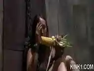 Bound woman eats a disgusting corn in sex dungeon BDSM