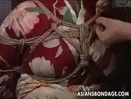 Busty Asian mature submissive bitch gets tied up with rope