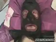 Hooded slave receives a handjob from MILF mistress BDSM homemade