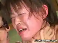 Rope suspended Asian slave girl cries from extreme hot waxing