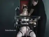 Tattooed girl in white fishnet stockings enjoys BDSM and bondage