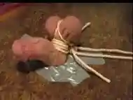 Tiny cock tied up and probed by a horny mistress