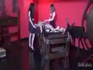 Two tantalizing girls enjoy BDSM and femdom with their slave