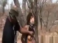 African slave made into pleasing cocks outdoors