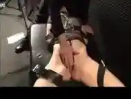 Fae Corbin restrained in the dungeon and fed cock