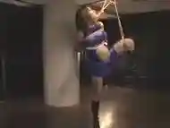 Pregnant Asian babe is strung up in her costume with her le