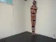 Taped Babe Tries To Escape Peril