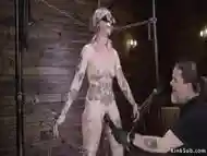 Alt Blonde Slave Isrestrained By Chains