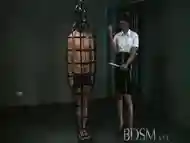 BDSM XXX Caged subs are humiliated before being taught