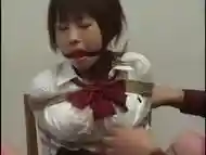 Busty uniformed Asian gets kinky rope torture