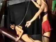 Collared Brunette Slave With Gagball In Mouth Licks Blonde