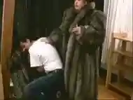 Cruel Fur-coated mistress dominates pathetic slave