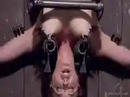 Clamped Blonde In Upside Down Position