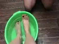 Femdome slave washes feet mistress