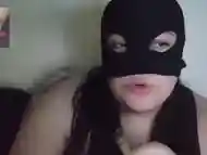 Masked chubby smokes in bed