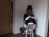 Sexy stylist in leather. Part 1: Haircut handcuffed customer