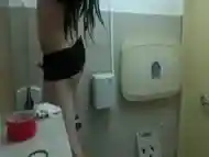 Sexy asian crossdresser in black, duct tape bondage from ceiling!!