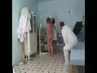 Pregnant redhead with big boobs is having sex with her gynecologist while nurse is masturbating