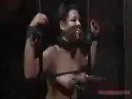 Tough girl in shackles gets her cunt pumped