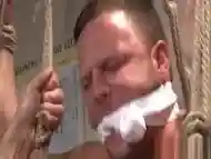 Muscular hunk gagged and fucked in tight ass