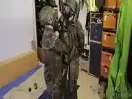 Two Soldiers In German Flecktarn In Gas Masks Wanking