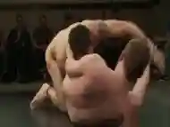 Wrestling hunks masturbating in foursome