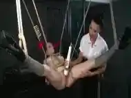 BDSM XXX Dom makes suspended subs pussy squirts like a fountain