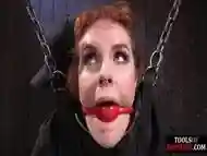 BDSM redhead slut cums hard from dildo stick by master