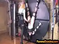 Blindfolded and bonded subject bows to femdom