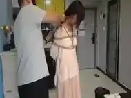 Chinese Girl In Long Dress In Bondage