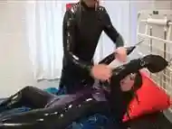 Dirty BDSM encounter in latex outfits