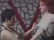 Horny lesbians perform wild BDSM in dungeon