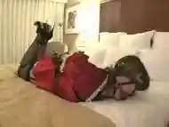 Maid in hotelroom bondaged on couch