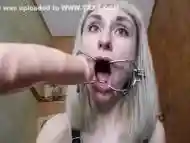 super deepthroat gagging camwhore with spider gag harness fucks her mouth