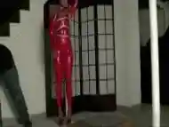 Bondage In Straigh Latex Catsuit And Ball Gag