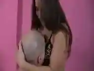 Mistress in lingerie smothers slave with her stomach and breasts segment