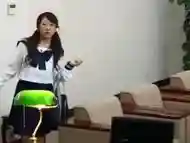 An older but still sexy Japanese teacher is getting punished