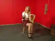 Busty Asian blonde tied up on a chair