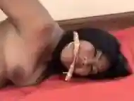 Sexy Asian chick hogtied on couch