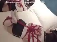 Two Students Tied On Bed