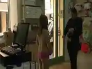 Asian slave disgraced in lingerie shop