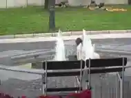 Busty slave bathing in fountain outdoor