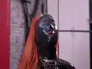 BDSM play with a latex doll. Facesitting, heels sucking, legs kissing