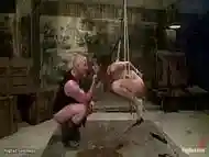 Babe in suspension throat fucked