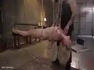 Hairy blonde whipped in suspension