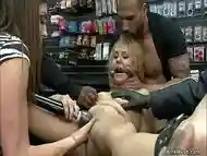 Petite blonde fucked in public sex shop