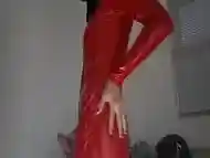 Sissy in red catsuit and dildo gag masturbates