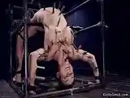 Sub takes backbend bondage and clamping