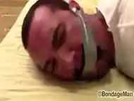 Victor SockGagged and TapeGagged tight and captured with socks inside his mouth wrapped the tape around his head PREVIEW