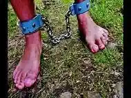 barefoot slave in chains